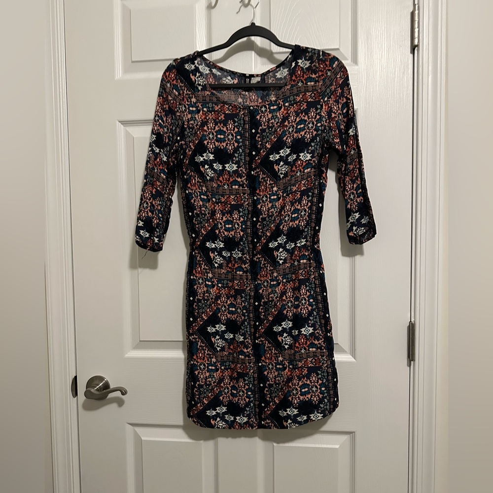 H&M 🎃dress under the Divided label. Pretty print with pocket details.